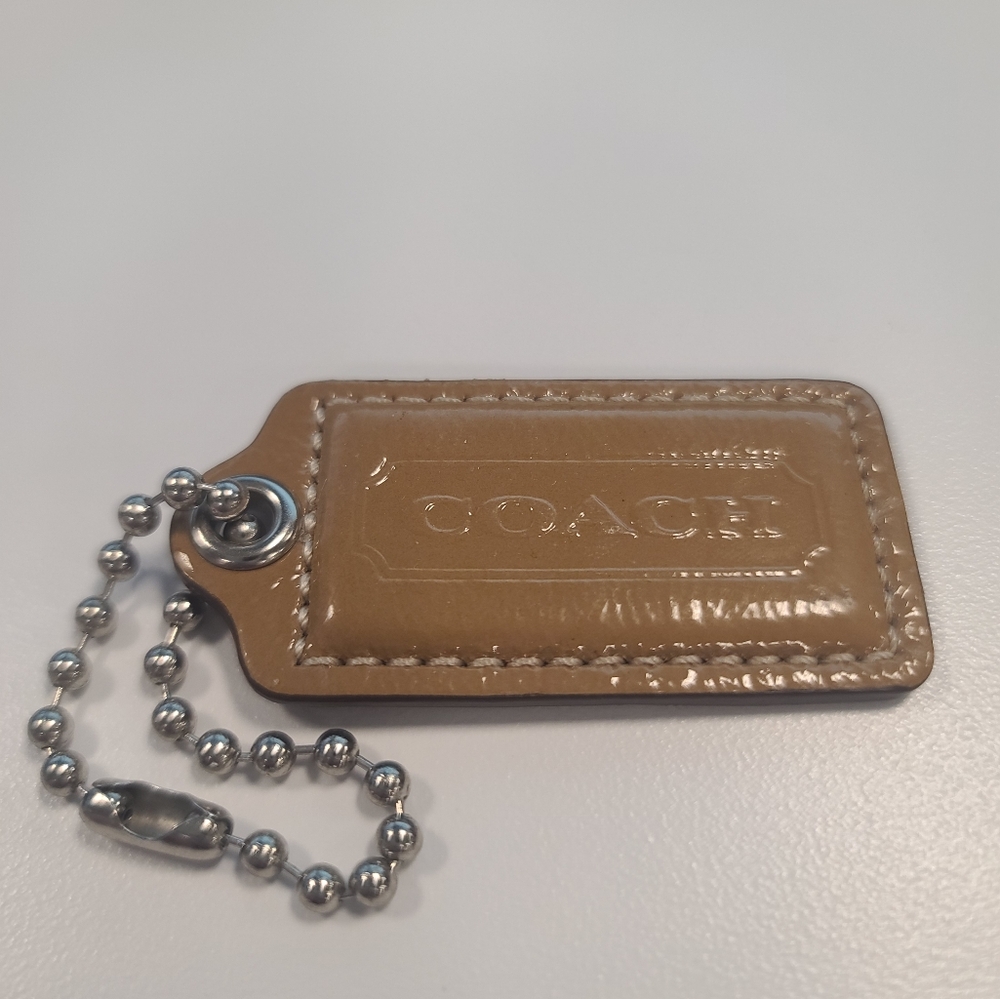 Coach hang tag patent leather tan